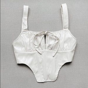 Shut It Down Corset by WANDERLUSH